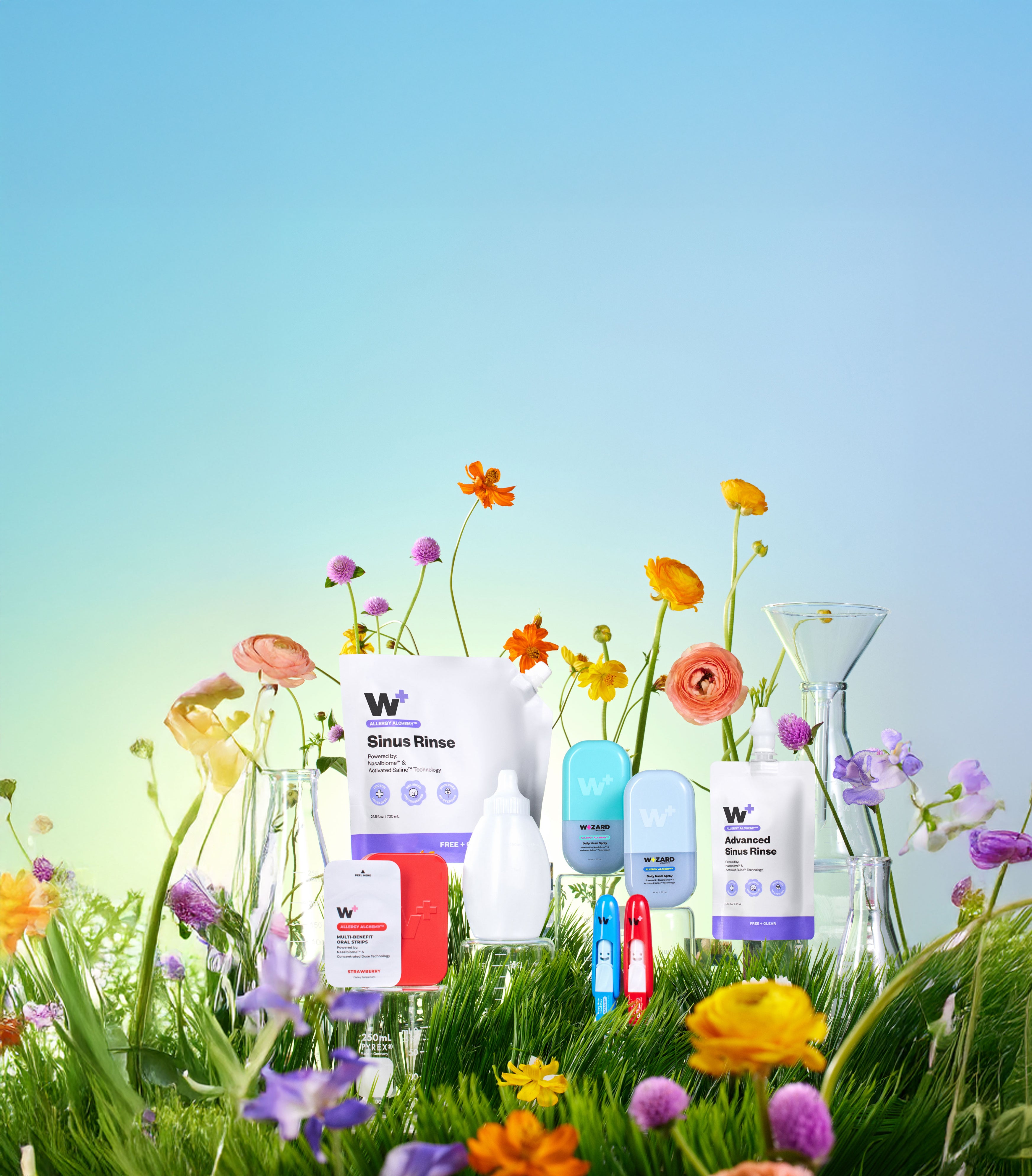Wizard Wellness products with flowers and grass in the background