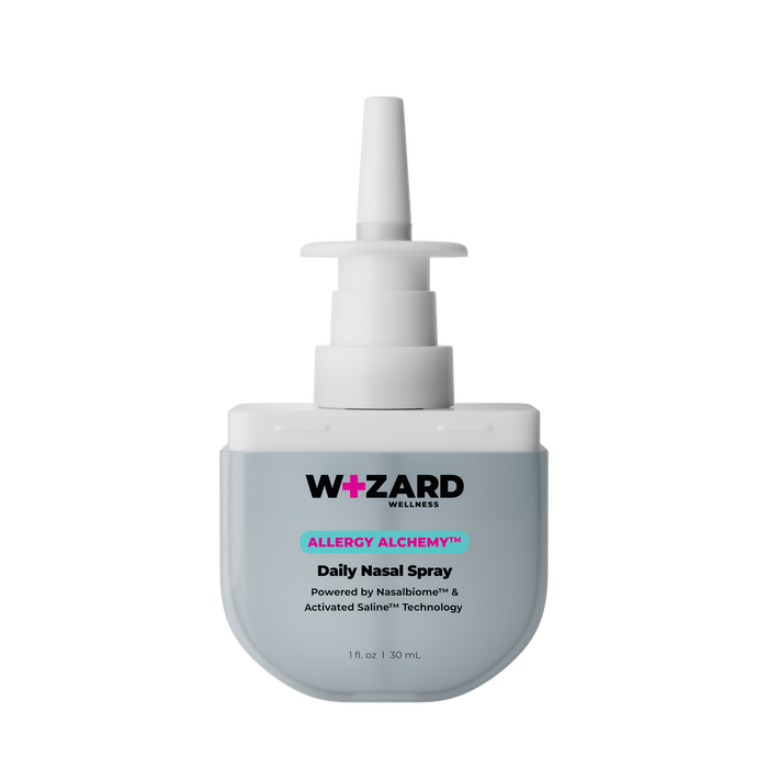 Nasal spray bottle labeled 'Wizard Wellness Allergy Alchemy' on a white background